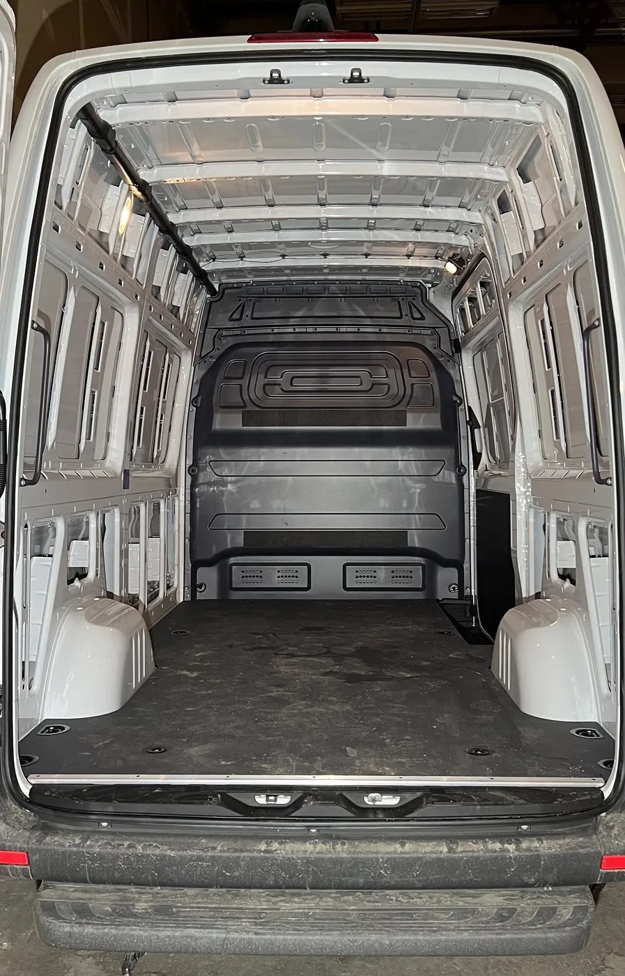 Before — disorganized van interior